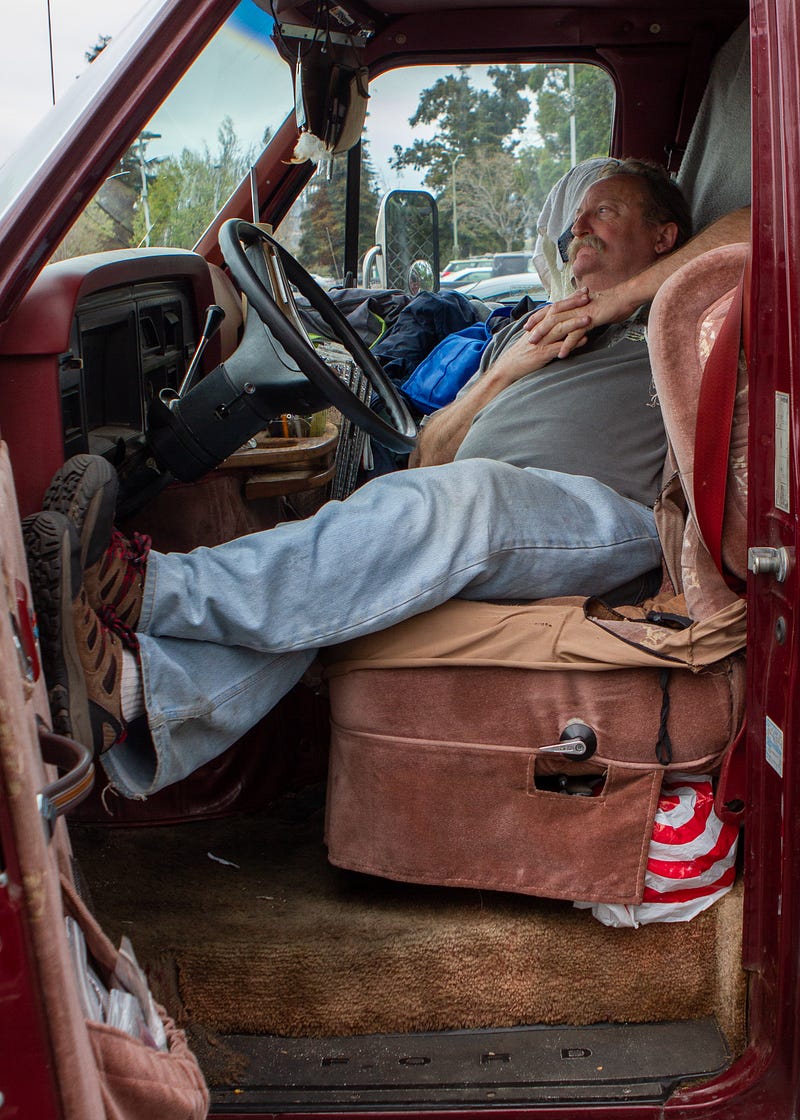 Marc Rowland lives in a maroon-colored van in the Laney College parking lot. A student at Merritt college, Rowland is taking sociology and psychology classes. He also takes a weight-training course at Laney. In 2008, Rowland lost his job of 17 years as a stationary engineer with Siemens.