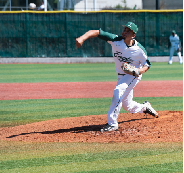 Starting pitcher Ricky Hernandez throws against Mendocino College April 9 at home. He came within one out of throwing a complete-game shutout.