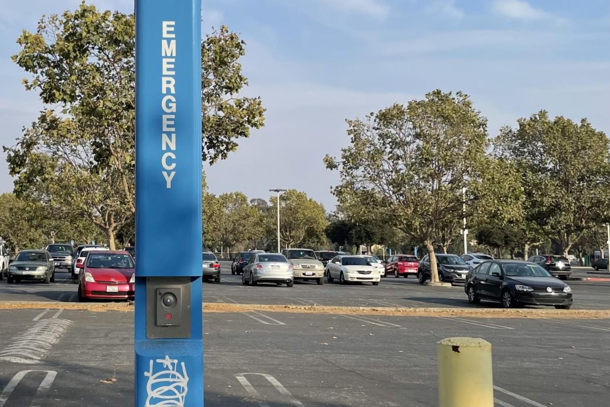A blue phone in the Laney College parking lot. District officials are advising community members to take precaution in parking lot areas after a recent vehicle burglary. 