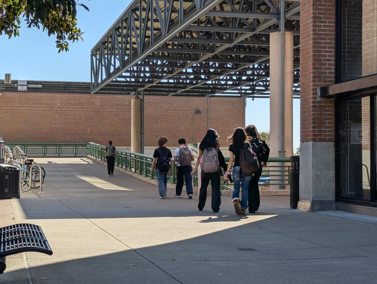 Students walk through the Laney Quad.