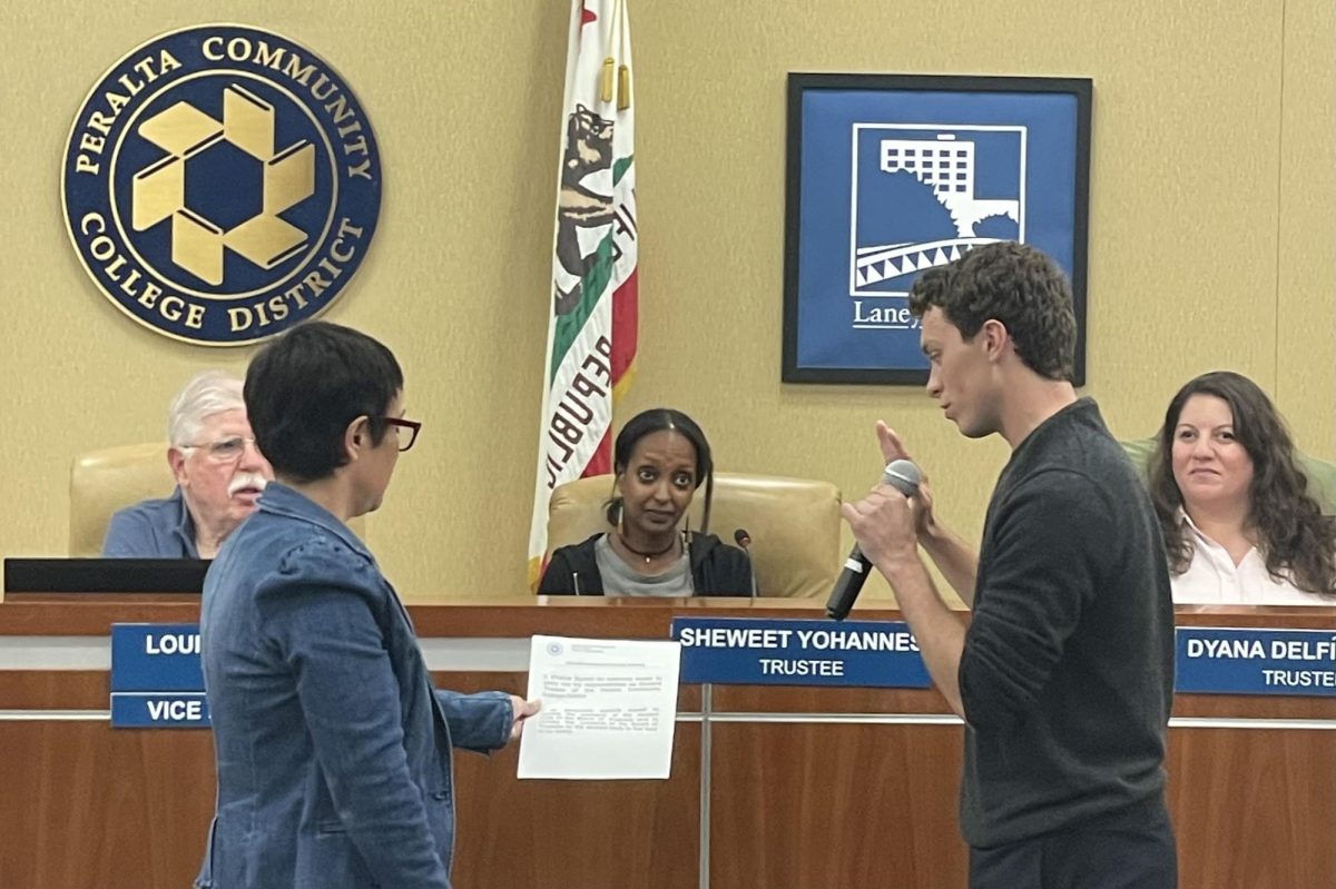 New Student Trustee Pierce Byrne takes the oath of office at the Sep. 10 meeting of the Peralta Community College District Board of Trustees.