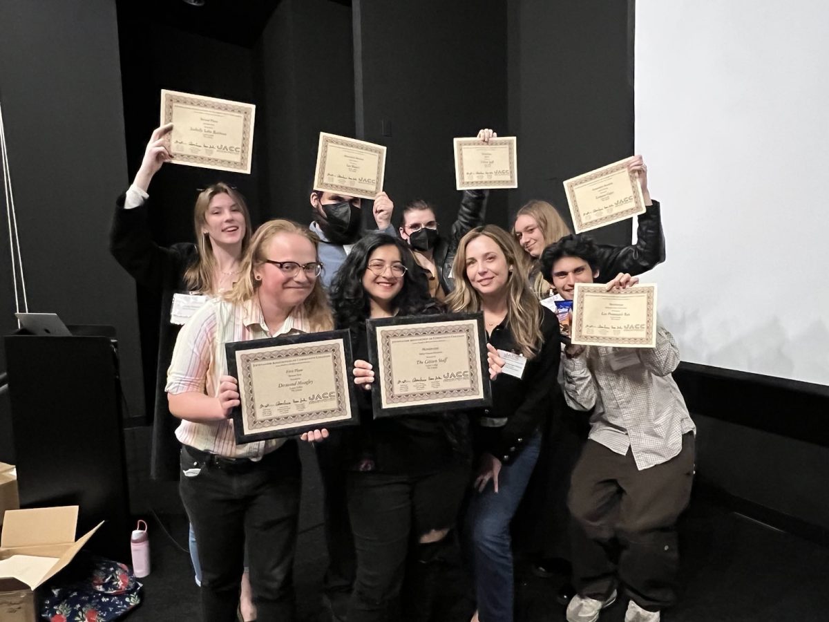 The Citizen staff and faculty advisor Eleni Gastis (center right) poses with nine awards from the Journalism Association of Community Colleges. (Photo: Annie Scaccia)