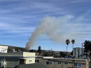 Smoke from the Keller Fire rises into the air above the Oakland hills. Residents near Merritt College and the Oakland Zoo were evacuated from the area Friday.