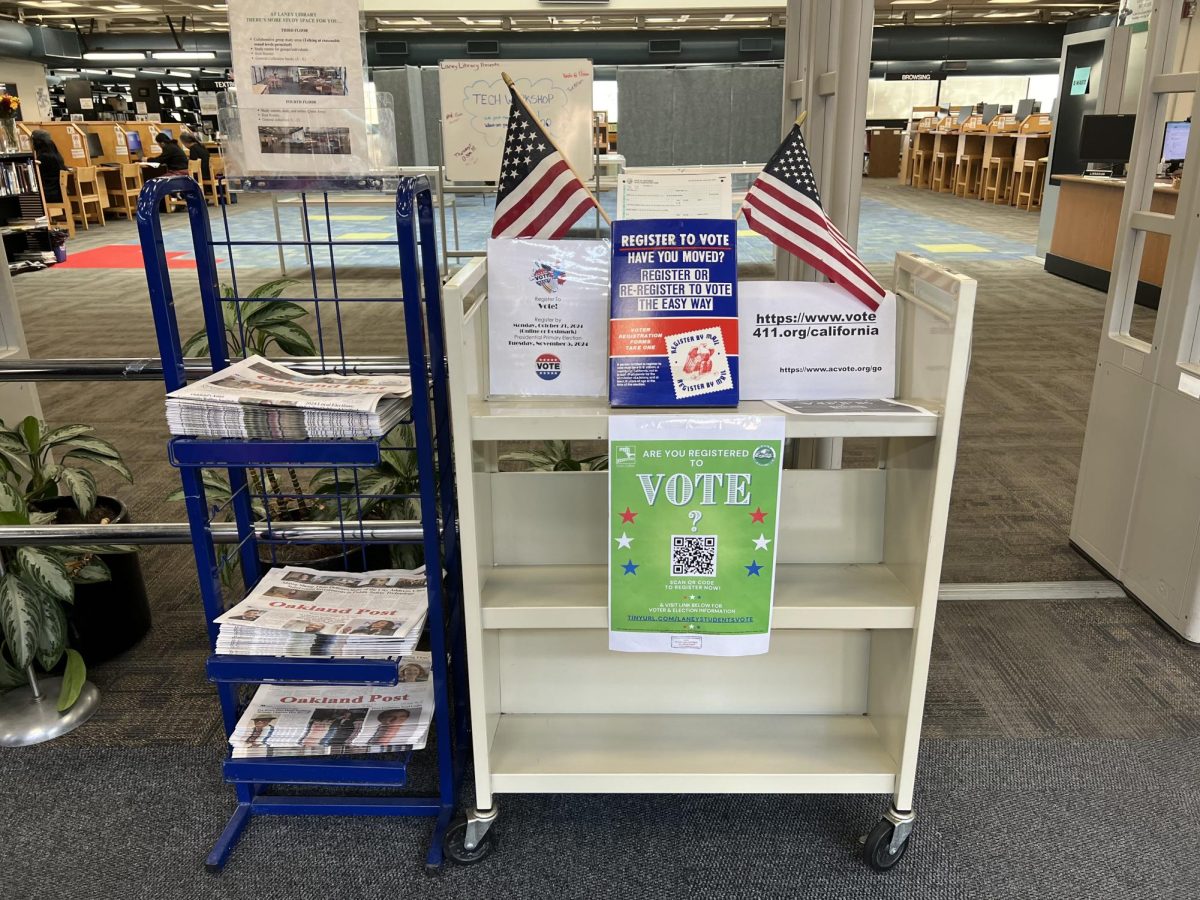 Voter registration display at Laney College library entrance. Photo by Kristina Hoessl.