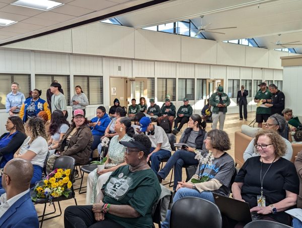 Laney athletics members line up for their turn during public comment.