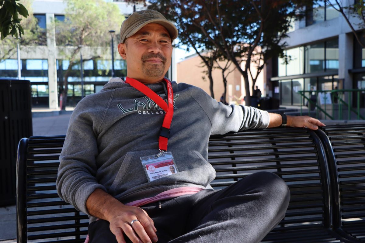 Laney counselor Philip Jucaban rests on a bench at Laney College in Oakland, CA on Oct. 29, 2025. Jucaban says he grounds his counseling work in the Filipino cultural value of bayanihan: “I’m just one counselor, but I like to bring a village together for each student,” Jucaban said.