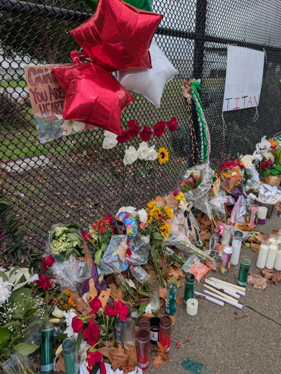 A community memorial for late Laney College Athletic Director John Beam sits outside the Laney College Fieldhouse in Oakland, CA on Nov. 17, 2025. The memorial has attracted mourners, tributes and messages of grief since Beam was pronounced dead on Nov. 14.